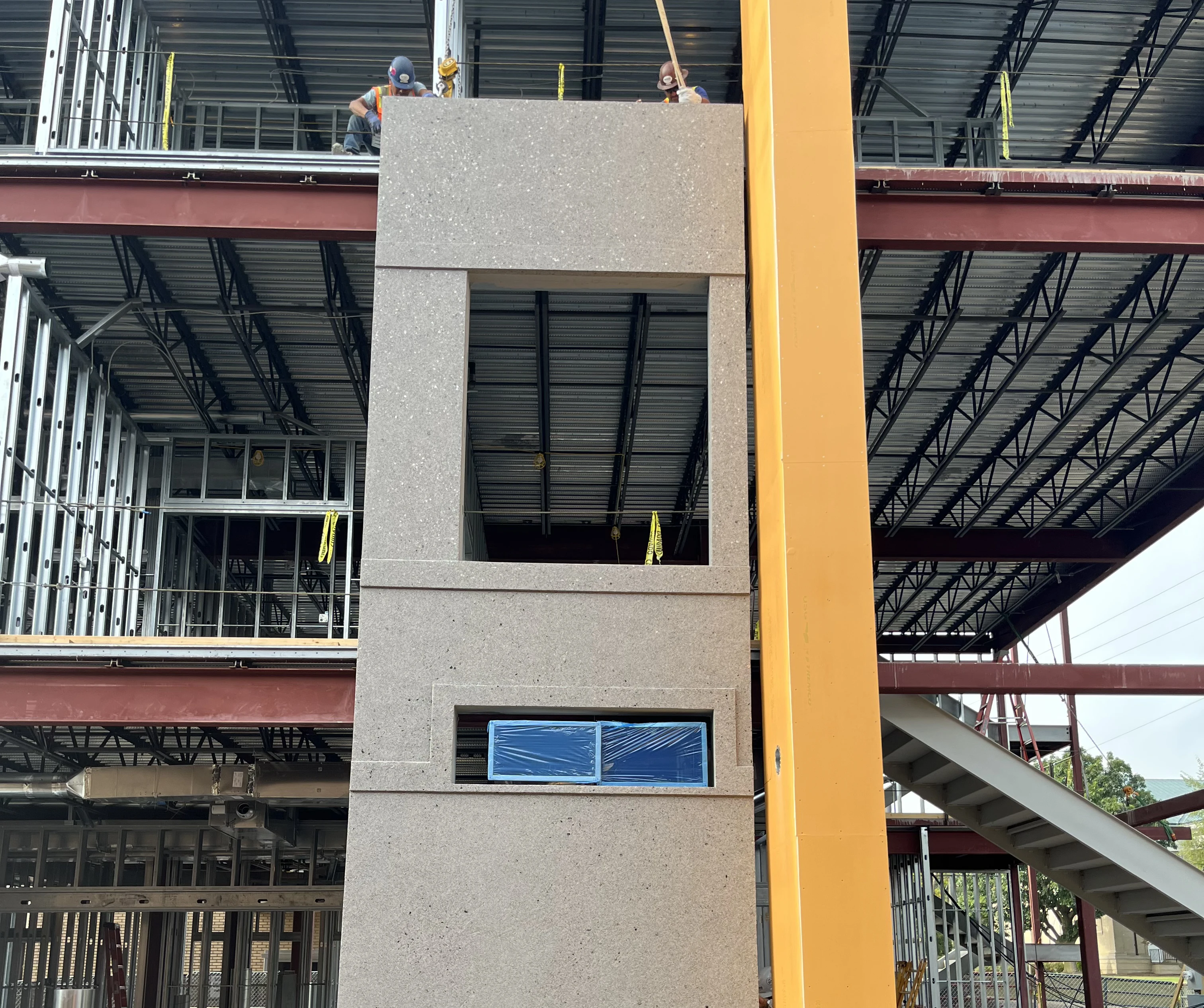exterior panel being hung